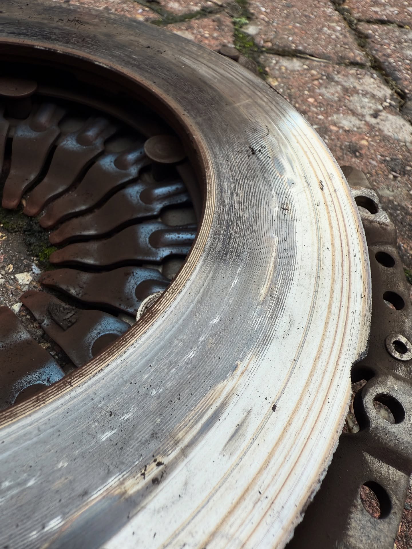 Worn clutch pressure plate removed during a Lara AutoCentre repair